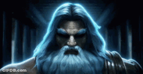 Man With Blue Hair And Beard In Dark Room GIF