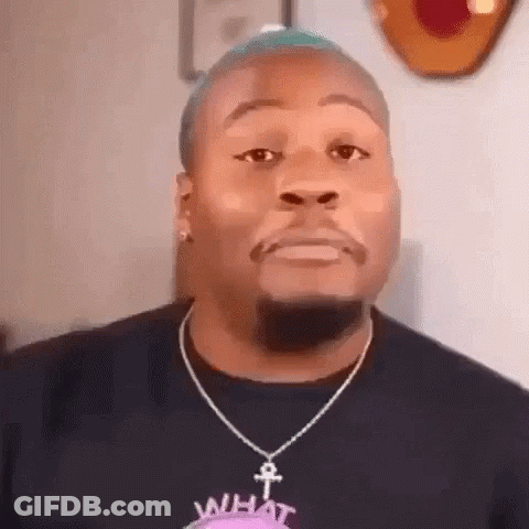 Man With Blue Hair And Beard Wearing Necklace And Earrings GIF