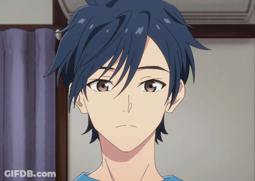 Man With Blue Hair And Brown Eyes Looking At Camera GIF