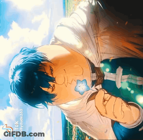 Man With Blue Hair And Flower On Chest Says Tik Tok GIF