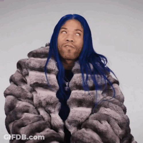 Man With Blue Hair And Fur Coat Looking Up GIF