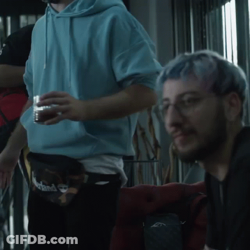 Man With Blue Hair And Glasses Looking GIF