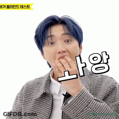 Man With Blue Hair And Plaid Jacket Holding NA GIF