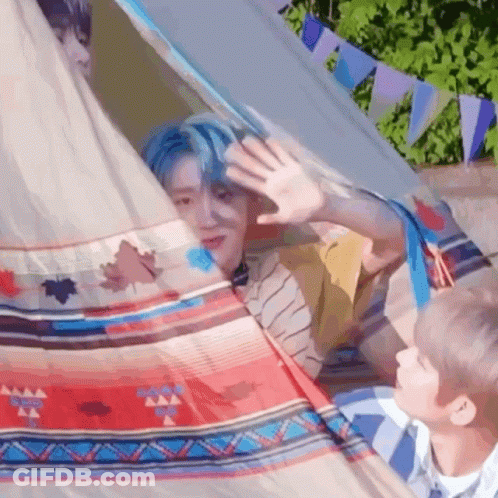 Man With Blue Hair In Tent GIF