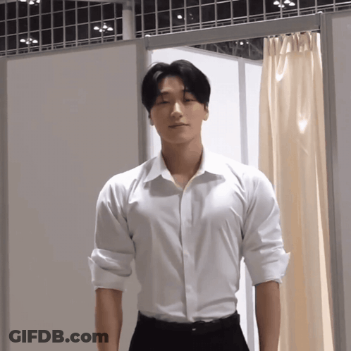 Man With Blue Hair Talking To Group GIF