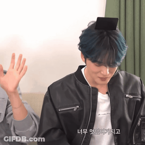 Man With Blue Hair Wearing Black Leather Jacket GIF
