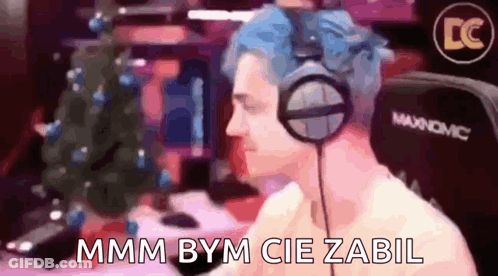 Man With Blue Hair Wearing Headphones At Computer GIF