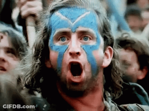 Man With Blue Paint Making Funny Face GIF