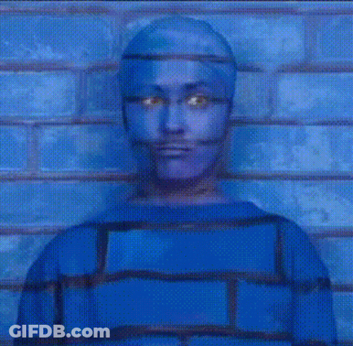 Man With Blue Painted Face Holding White IPhone GIF