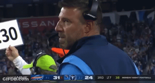 Man With Bose Headphones In Front Of Sign Saying 30 GIF