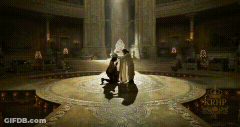Man With Bow And Arrow In Hut GIF