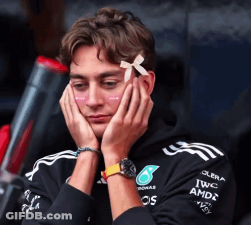 Man With Bow On Forehead Wearing Petronas Hoodie GIF