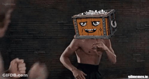 Man With Box On Head Being Punched GIF