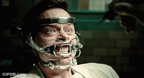 Man With Brace On Face Getting Drilled GIF