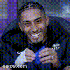 Man With Braids Smiling Holding Blue Object GIF