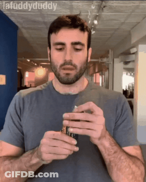 Man With Bread Falling Over GIF