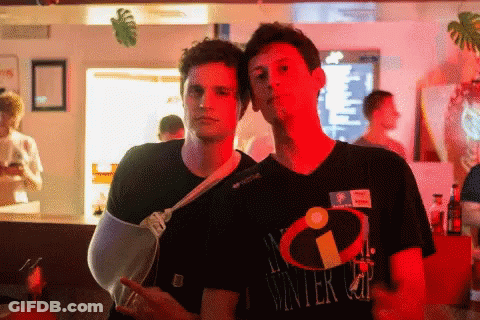 Man With Broken Arm Beside Winter Cup Shirt GIF