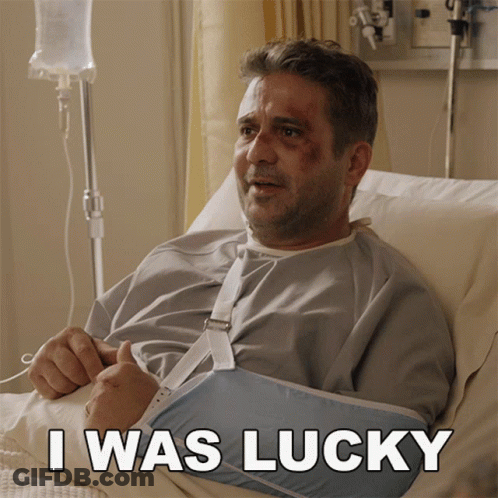 Man With Broken Arm In Hospital Bed Saying I Was Lucky GIF