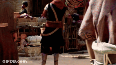 Man With Bucket On Head Standing In Crowd GIF