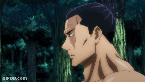 Man With Bun Standing In Forest GIF