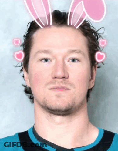 Man With Bunny Ears And Pink Hearts GIF