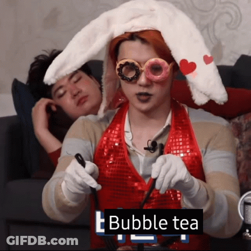 Man With Bunny Ears Holding Bubble Tea GIF