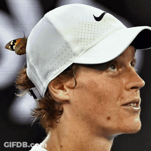 Man With Butterfly On White Nike Hat GIF