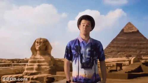 Man With Camera At Pyramid GIF