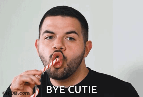 Man With Candy Cane Saying Bye Cutie GIF
