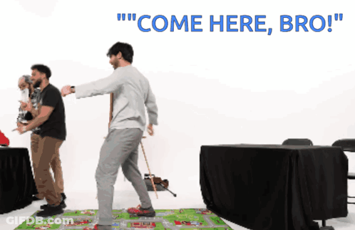 Man With Cane Dancing In Front Of Come Here Bro Sign GIF