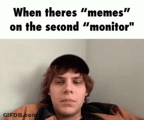 Man With Caption When Theres Memes On Second Monitor GIF
