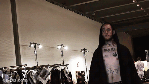 Man With Chest Tattoo And Love Shirt GIF