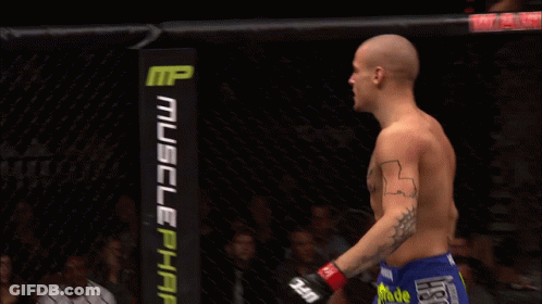 Man With Chest Tattoo In Cage With Dodge Sign GIF