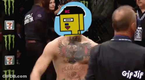 Man With Chest Tattoo In Front Of Monster Energy Sign GIF