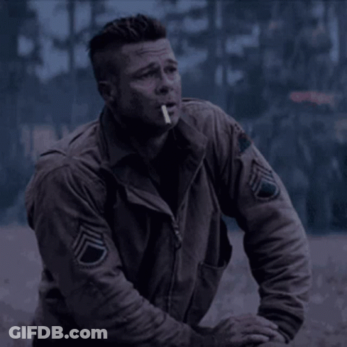 Man With Cigarette In Jacket With Letter D On Sleeve GIF