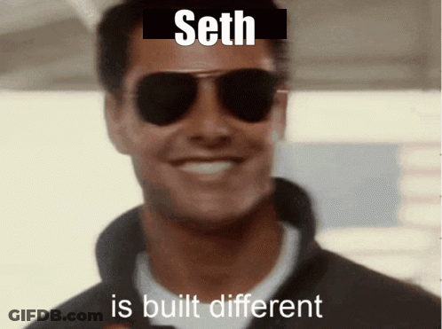 Man With Cigarette Surrounded By Men's Faces And Aaron GIF