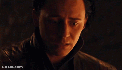 Man With Closed Eyes In Dark Room GIF