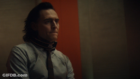 Man With Collar In Front Of Good Riddance Sign GIF