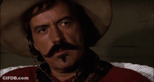 Man With Cowboy Hat And Mustache Says Bye GIF