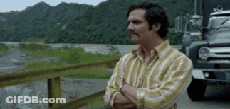Man With Crossed Arms Next To Truck GIF