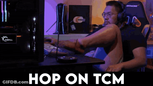 Man With Crossed Legs And Headphones Hop On TCM GIF
