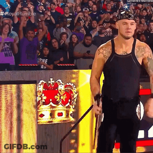 Man With Crown Facing Crowd #RoyalRumble GIF