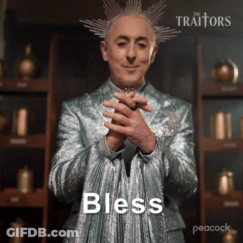 Man With Crown In Silver Suit Saying Bless GIF