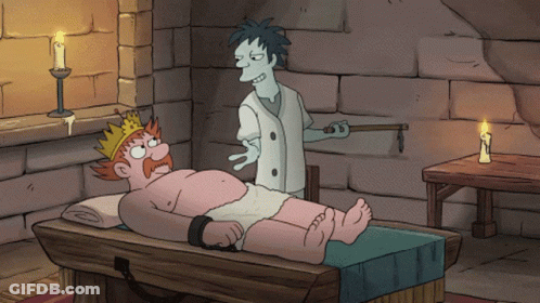Man With Crown Laying On Table GIF