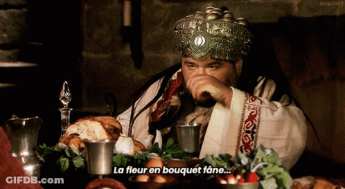 Man With Crown Says La Fleur En Bouquet Fane GIF