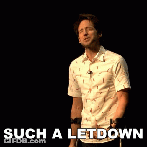 Man With Crutches In Front Of Such A Let Down Sign GIF