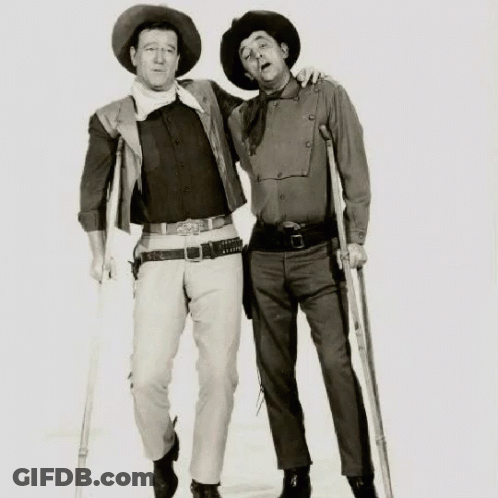 Man With Crutches Next To Man GIF