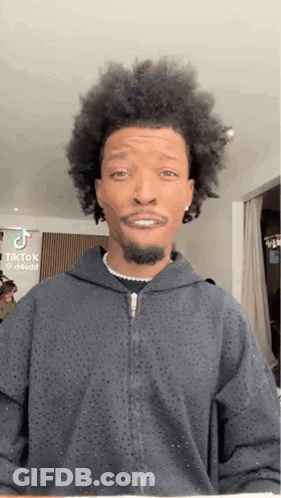 Man With Curly Hair And Beard Making Funny Face GIF
