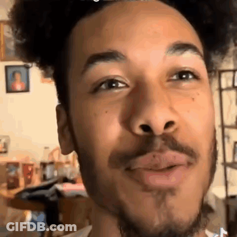 Man With Curly Hair And Beard Making Funny Face GIF