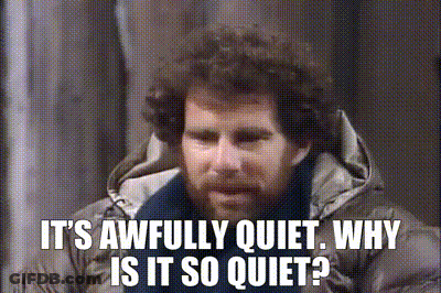 Man With Curly Hair And Beard Saying It's Quiet GIF